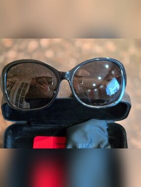 Salvatore Ferragamo Black Round Sunglasses with Tinted Lenses